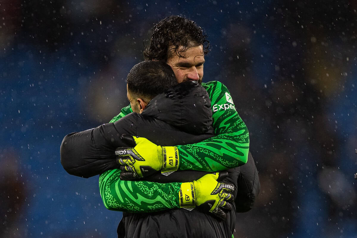 MANCHESTER, ENGLAND - Sunday, February 23, 2025: Liverpool's goalkeeper Alisson Becker celebrates with Mohamed Salah after the FA Premier League match between Manchester City FC and Liverpool FC at the City of Manchester Stadium. Liverpool won 2-0. (Photo by David Rawcliffe/Propaganda)